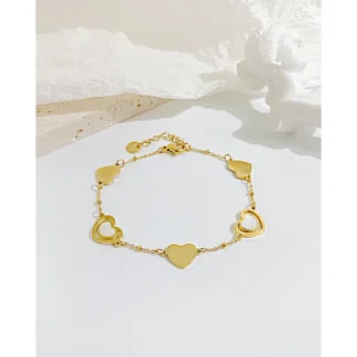 Gold plated stainless steel hollow heart charm bracelet